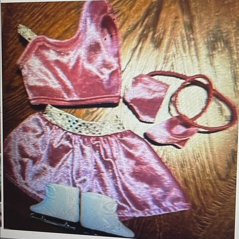 Our Generation doll pink ice-skating outfit